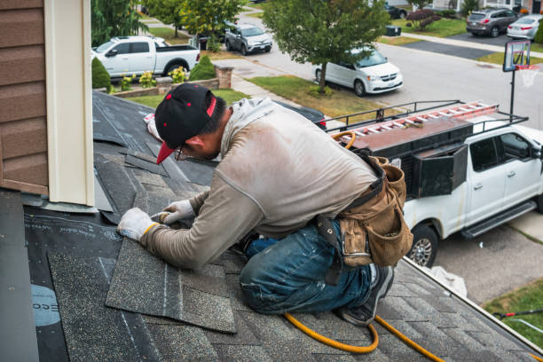 Professional Roof Replacement technician working in Mapleton, OR
